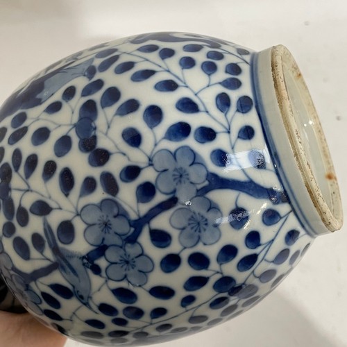 363 - A Chinese blue and white double-gourd vase, figural and floral decoration with jars, height 29cm