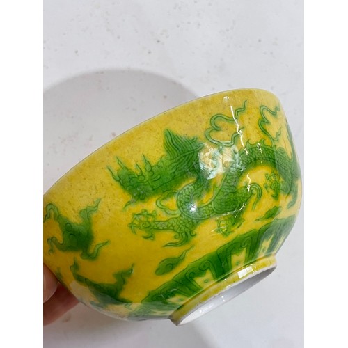 282 - A Chinese yellow ground green glaze 'dragon' bowl, 6 character mark, diameter 12cm