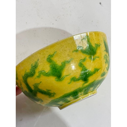 282 - A Chinese yellow ground green glaze 'dragon' bowl, 6 character mark, diameter 12cm