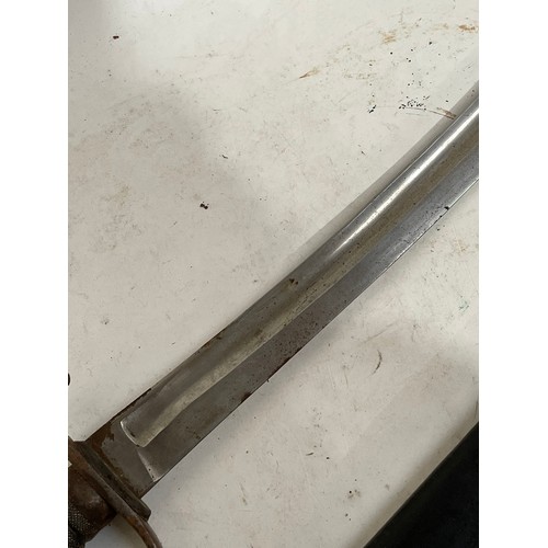 185 - A British police curved sword and scabbard, with shagreen grip, blade length 60cm signed DW50