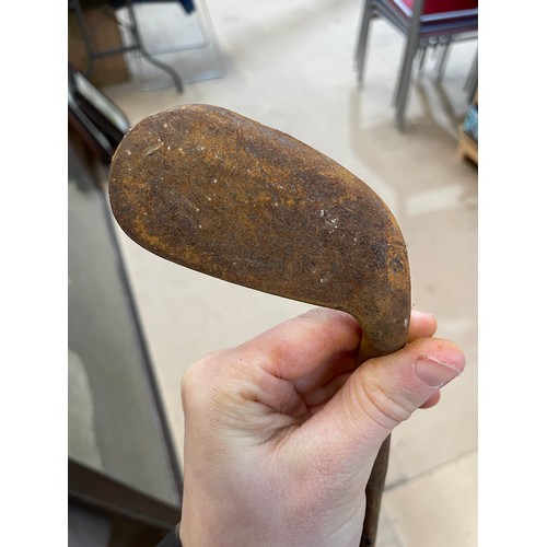 862 - 7 Antique wooden-shafted golf clubs