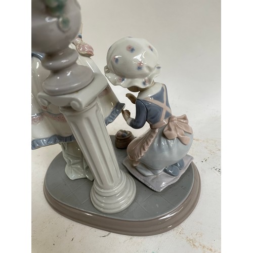 307 - A Lladro porcelain figural group, A Stitch In Time, model no. 5344, height 24cm