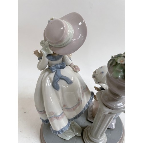 307 - A Lladro porcelain figural group, A Stitch In Time, model no. 5344, height 24cm