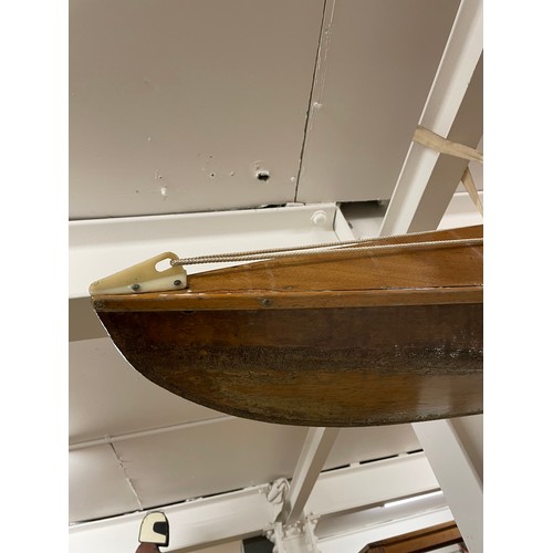 2548 - A Vintage kayak with paddle and life jacket, L446cm