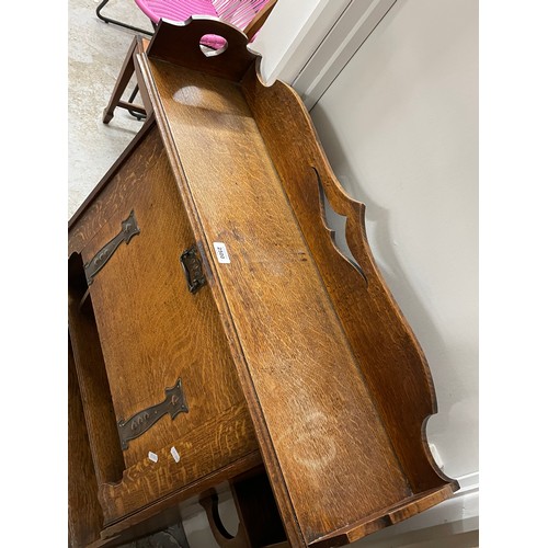 2500 - An Arts and Crafts oak student's bureau, W88cm, H120cm, D30cm