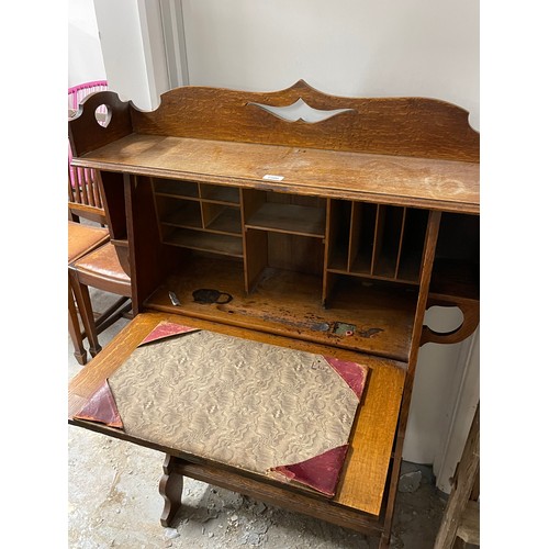 2500 - An Arts and Crafts oak student's bureau, W88cm, H120cm, D30cm