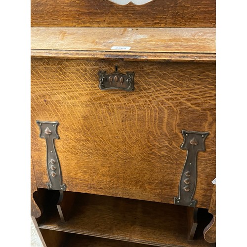 2500 - An Arts and Crafts oak student's bureau, W88cm, H120cm, D30cm