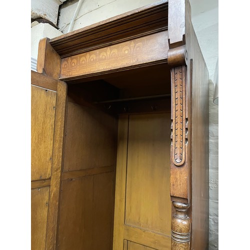 2011 - A Victorian Arts and Crafts hall cupboard, with a single carved and panelled door, W60cm, H192cm, D6... 