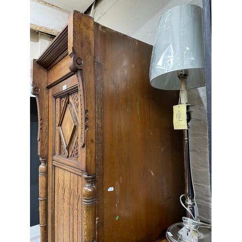 2011 - A Victorian Arts and Crafts hall cupboard, with a single carved and panelled door, W60cm, H192cm, D6... 