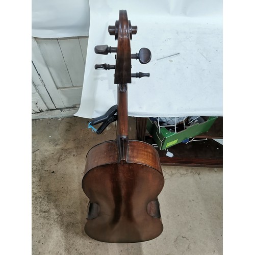 923 - A Vintage cello, back length 75cm, with carrying case, bows and music stand