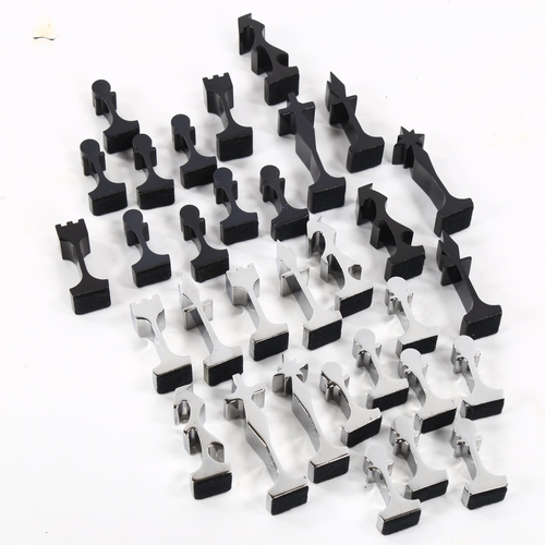 1614 - A 1960s' modernist chess set by ALCAN, France, aluminium pieces with aluminium framed mirror board, ... 