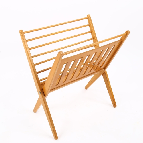 1620 - A mid-century folding, beech framed, magazine rack, height 51cm.