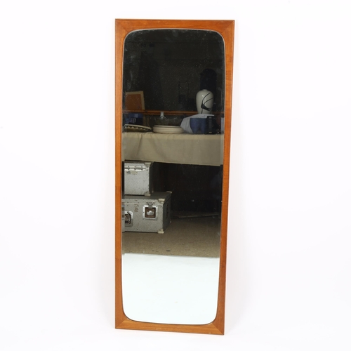 1622 - A Danish mid-century teak framed wall mirror, stamped Made in Denmark on reverse, height 116cm.