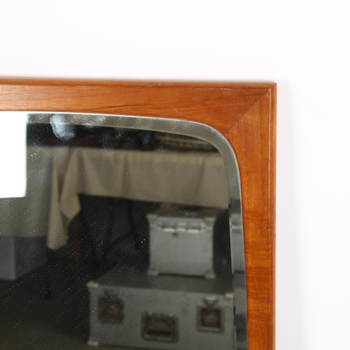 1622 - A Danish mid-century teak framed wall mirror, stamped Made in Denmark on reverse, height 116cm.