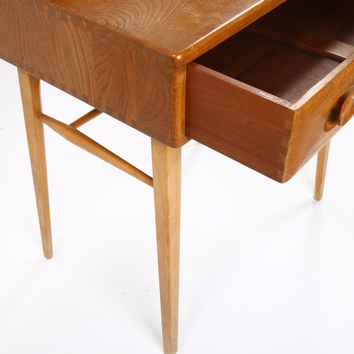 1624 - A 1950/60s' ERCOL, model 479/439, writing desk in elm and beech, H 95cm, W 69cm, D 48cm.