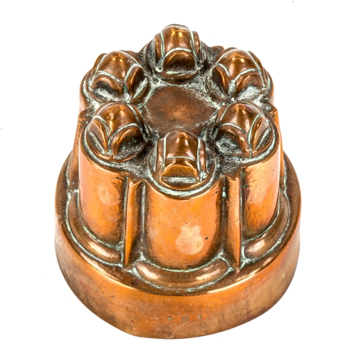 1003 - A Victorian copper jelly mould, by Maple & Co Ltd of London, no. 481, diameter 12.5cm, height 11.5cm