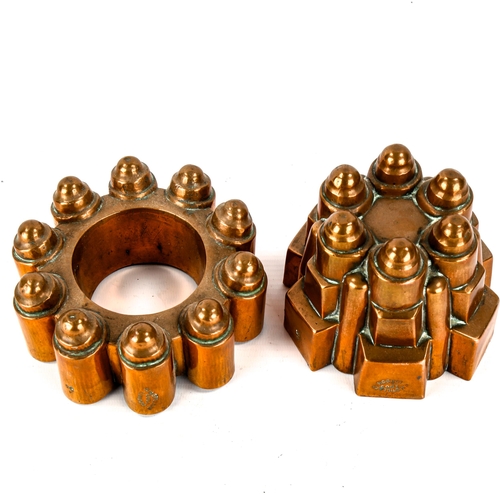 1004 - 2 Victorian copper jelly moulds, by W M Still & Co of London, both dated 1903, with stamped British ... 