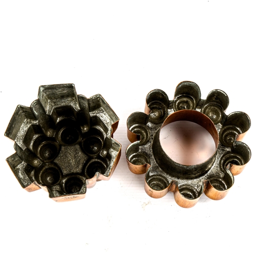 1004 - 2 Victorian copper jelly moulds, by W M Still & Co of London, both dated 1903, with stamped British ... 