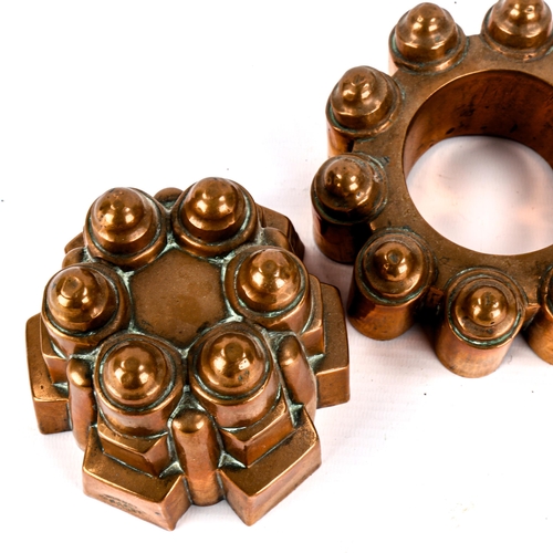 1004 - 2 Victorian copper jelly moulds, by W M Still & Co of London, both dated 1903, with stamped British ... 