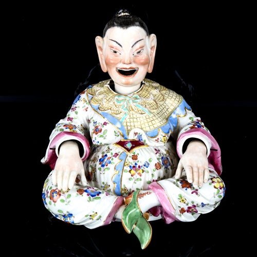 1013 - A Meissen porcelain nodding Pagoda figure, 19th century, seated form with wagging tongue and articul... 