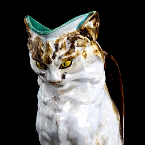 1014 - A rare Mintons Majolica pottery figural cat jug, circa 1910, probably modelled by Paul Comolera, mod... 