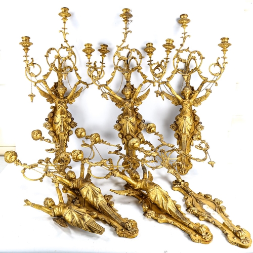 1016 - A garniture of 6 French gilt gesso angel wall sconces, with twisted wrought-iron wirework foliate sw... 