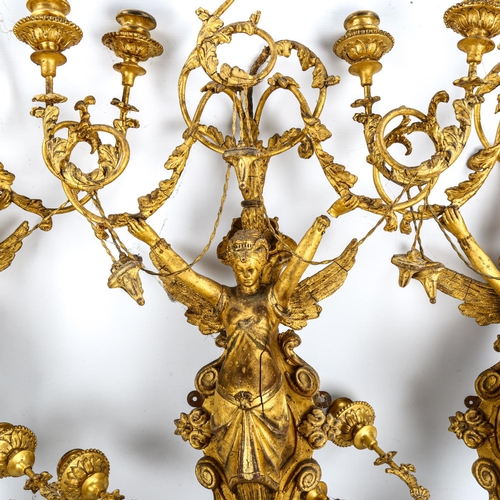 1016 - A garniture of 6 French gilt gesso angel wall sconces, with twisted wrought-iron wirework foliate sw... 