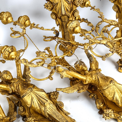 1016 - A garniture of 6 French gilt gesso angel wall sconces, with twisted wrought-iron wirework foliate sw... 