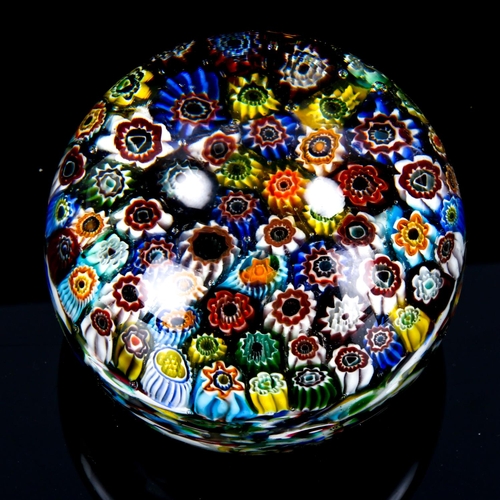 1034 - A large Millefiori glass paperweight, diameter 9cm