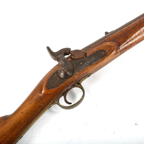 1053 - An Antique percussion rifle, by Maybury & Sons