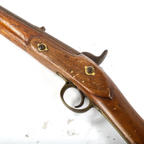 1053 - An Antique percussion rifle, by Maybury & Sons