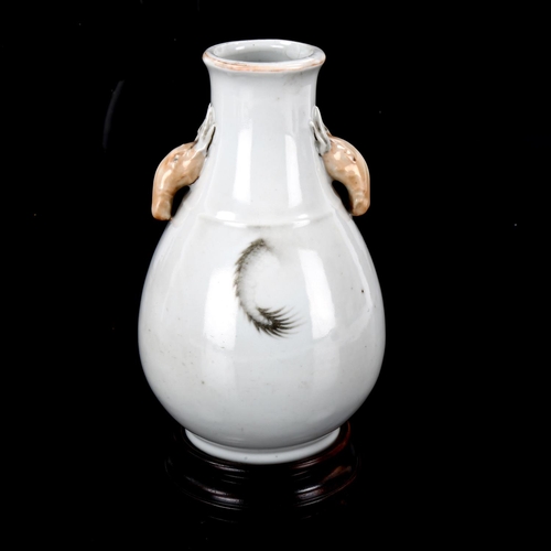 1058 - A small Chinese porcelain Hu dragon vase, Qing Dynasty, with 4 character Tongzhi mark and of the per... 