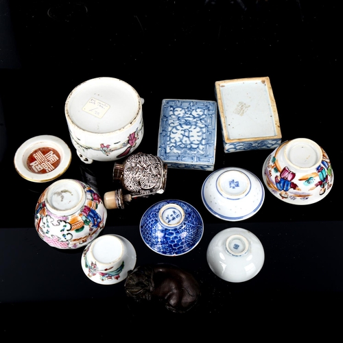 1064 - A group of Oriental items, including porcelain tea bowls, unmarked white metal snuff bottle, bronze ... 