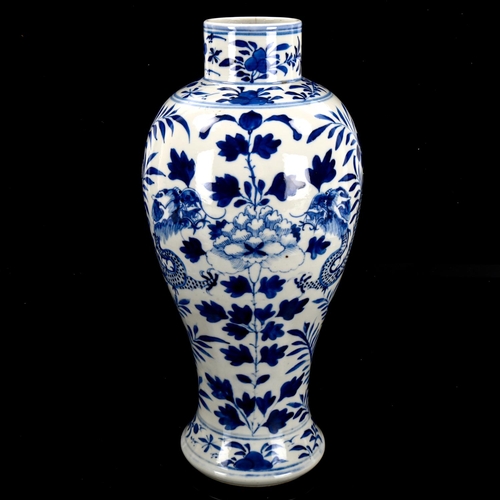 1066 - A Chinese blue and white porcelain dragon vase, 4 character mark, height 31cm