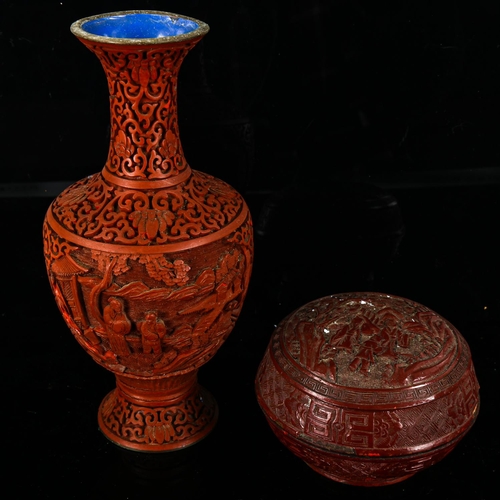 1071 - A Chinese cinnabar lacquer vase, height 23cm, and a similar circular box (2)