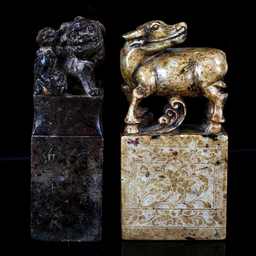 1073 - 2 Chinese soapstone seals surmounted by buffalo and dragon figures, engraved text inscriptions, heig... 