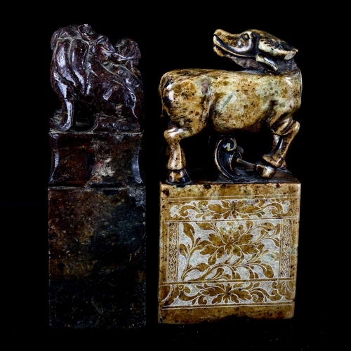 1073 - 2 Chinese soapstone seals surmounted by buffalo and dragon figures, engraved text inscriptions, heig... 