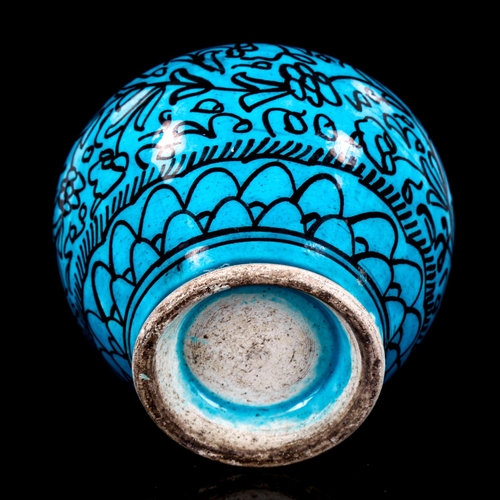 1074 - A Middle Eastern Iznik turquoise glaze ceramic narrow-neck vase, with hand painted decoration, heigh... 