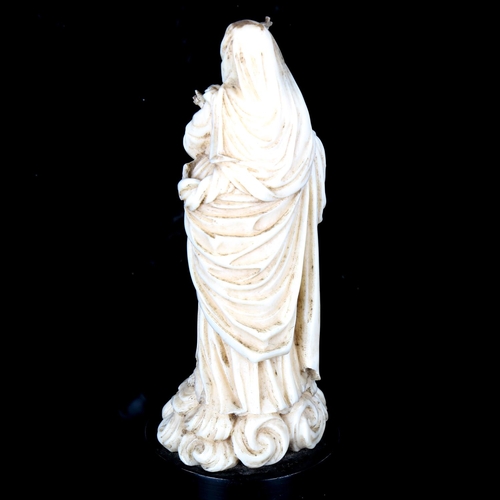 1077 - A carved ivory figure of Mary with the Infant Christ, 18th or 19th century, on ebonised wood plinth ... 