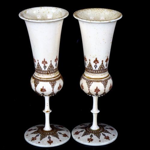 1079 - A pair of 19th century Indian ivory goblets with painted and engraved decoration, height 13cm