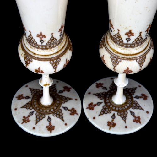 1079 - A pair of 19th century Indian ivory goblets with painted and engraved decoration, height 13cm