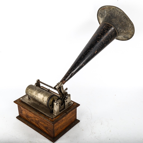 1083 - A Vintage wax cylinder player, late 19th century, in original oak case with original tin horn, no ma... 