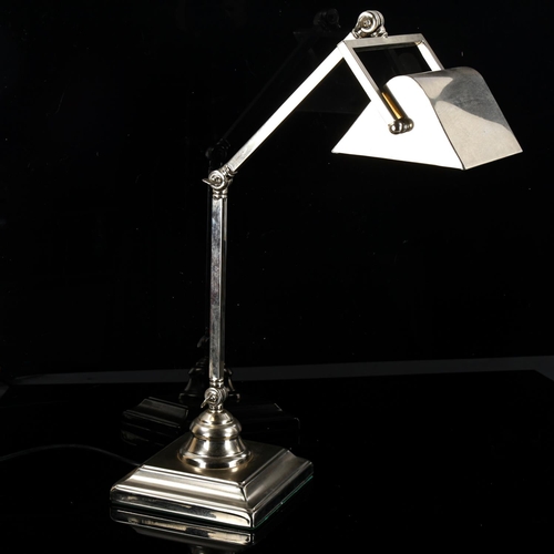 1087 - A silver plated anglepoise desk lamp, with plated shade