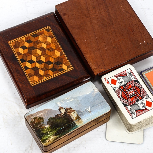 1100 - A Tunbridge Ware playing card box, with cube parquetry decorated lid, 10.5cm x 8.5cm, containing 2 s... 