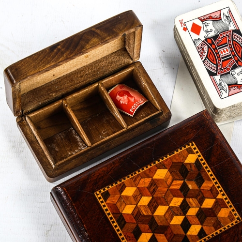 1100 - A Tunbridge Ware playing card box, with cube parquetry decorated lid, 10.5cm x 8.5cm, containing 2 s... 