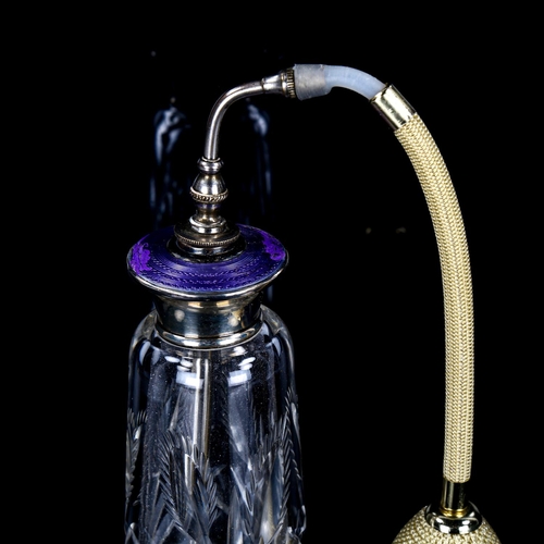 1104 - A cut-glass silver and purple enamel atomiser perfume bottle, height to enamel top 17cm