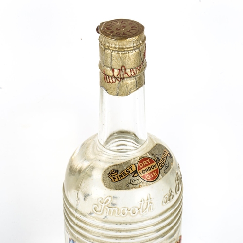 1120 - A mid 1950s' bottle of Burnett's White Satin Gin, with spring top fastening, 70% proof.