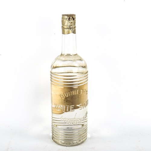 1120 - A mid 1950s' bottle of Burnett's White Satin Gin, with spring top fastening, 70% proof.