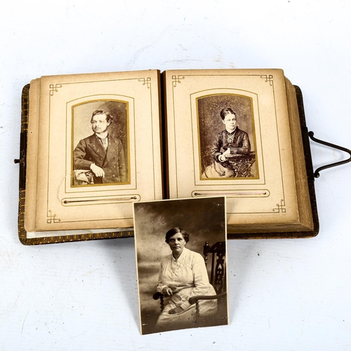 1123 - A Victorian leather-bound album of carte de visite, album size 16cm x 13cm