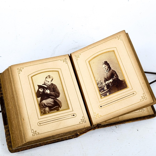 1123 - A Victorian leather-bound album of carte de visite, album size 16cm x 13cm